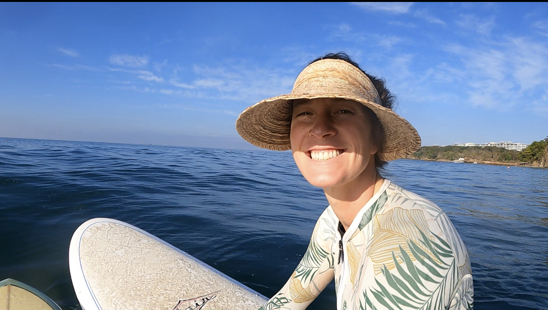 Dr. Whitney Boulton on a paddleboard in the ocean