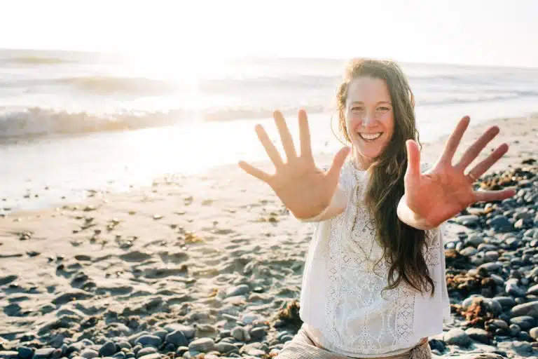 Dr. Whitney Boulton smiling on the beach